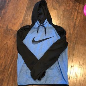 Blue and black womens Nike sweater